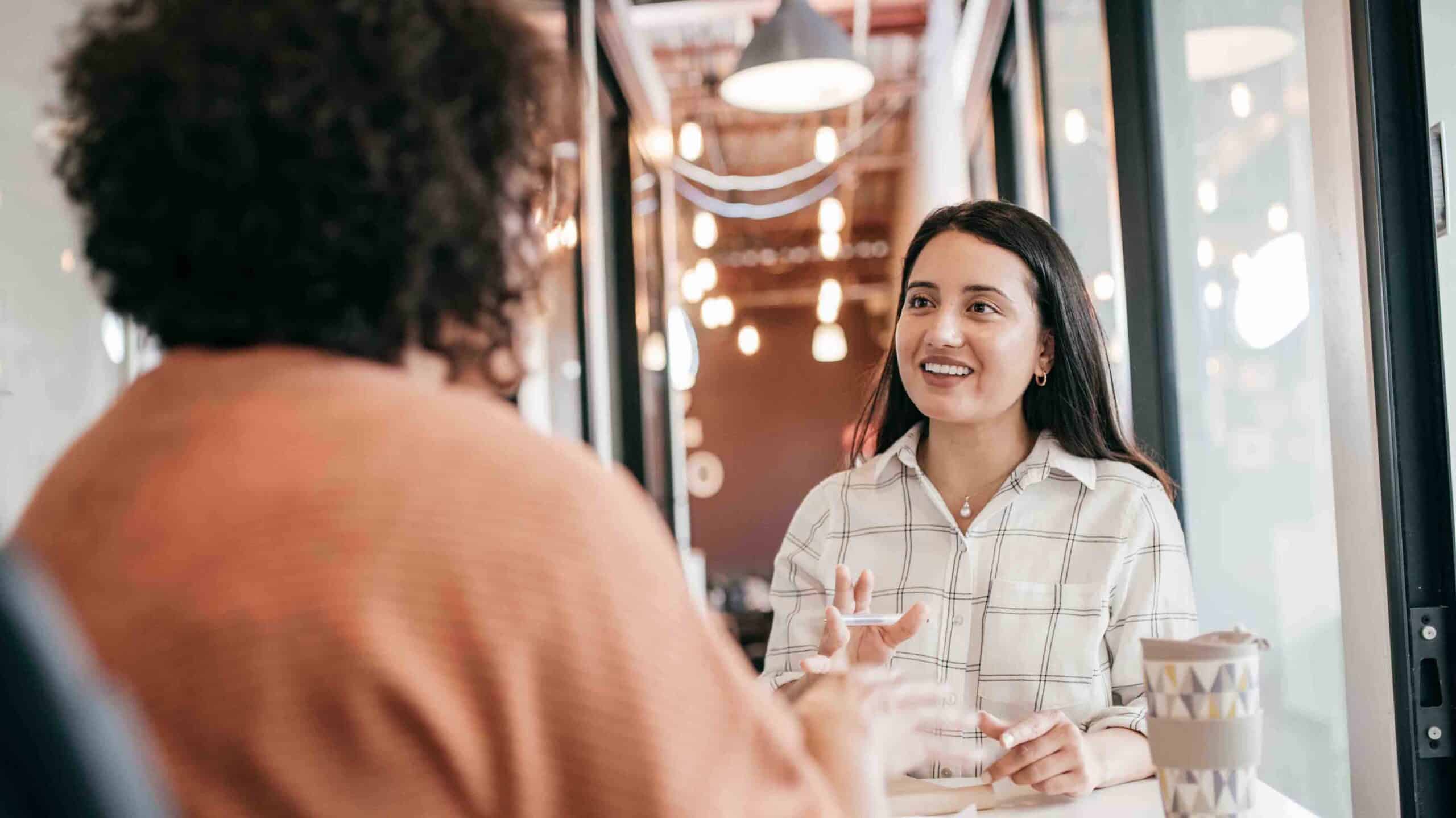 Two people in friendly discussion