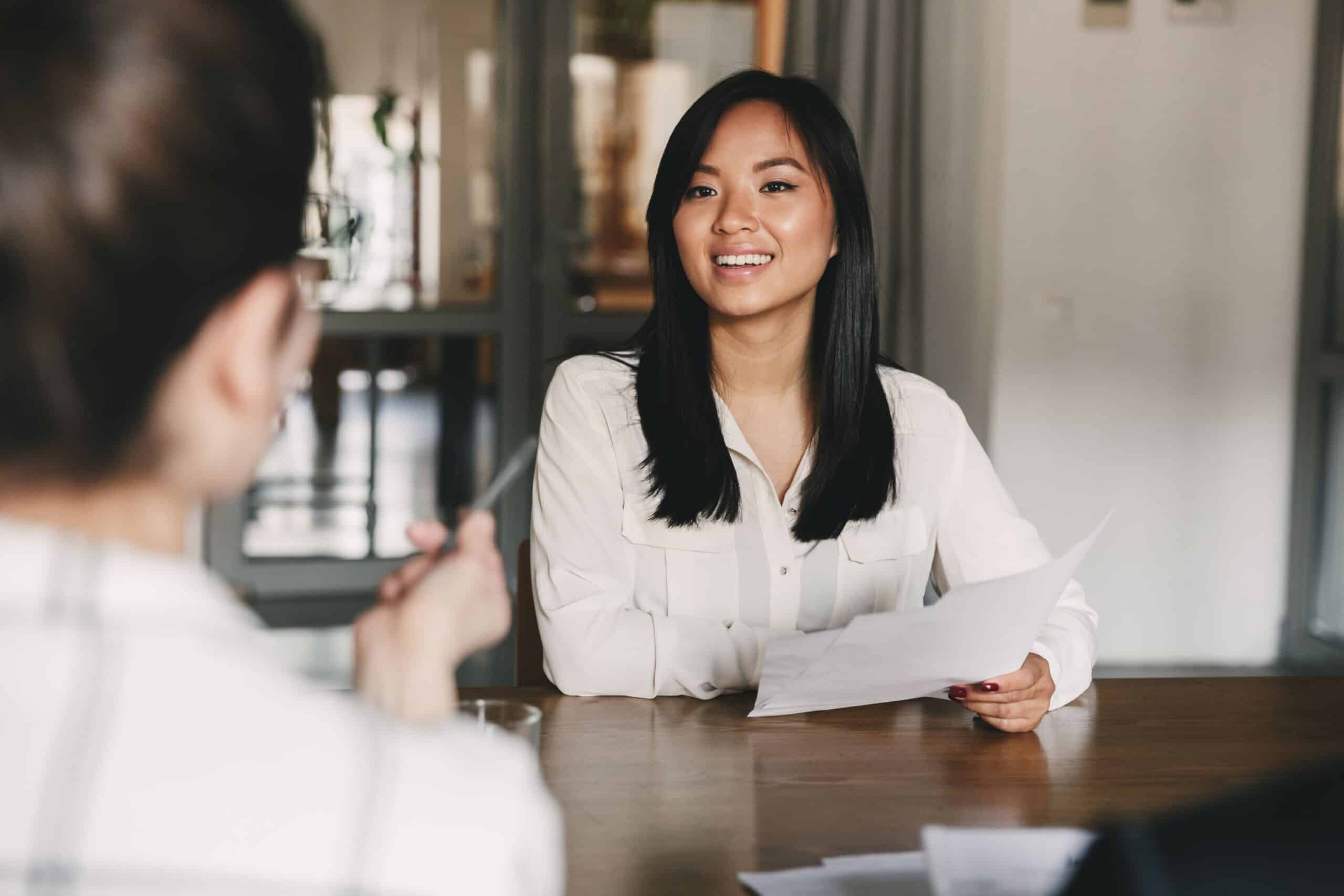 A woman in an in-person interview
